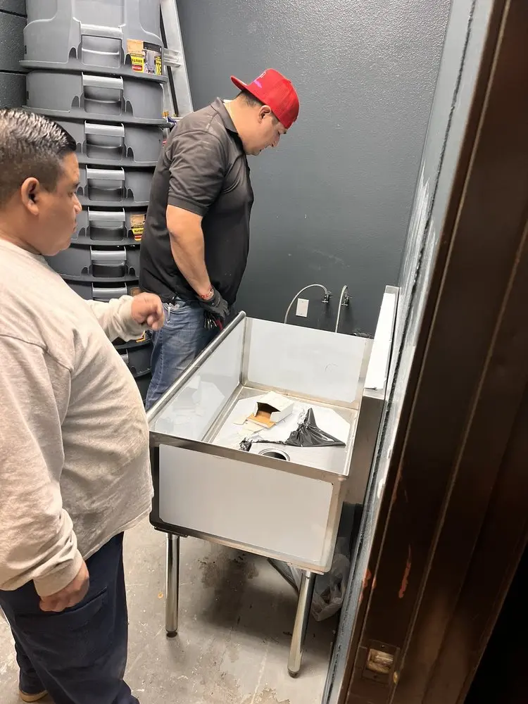 Commercial plumbing and sink installation in Holmes